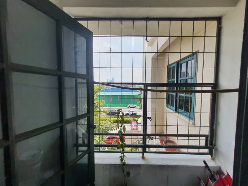 Room features: metal window frame, grid security bars, view of water, view of vehicles, concrete wall, green exterior wall, plants visible, open window; view: sea.