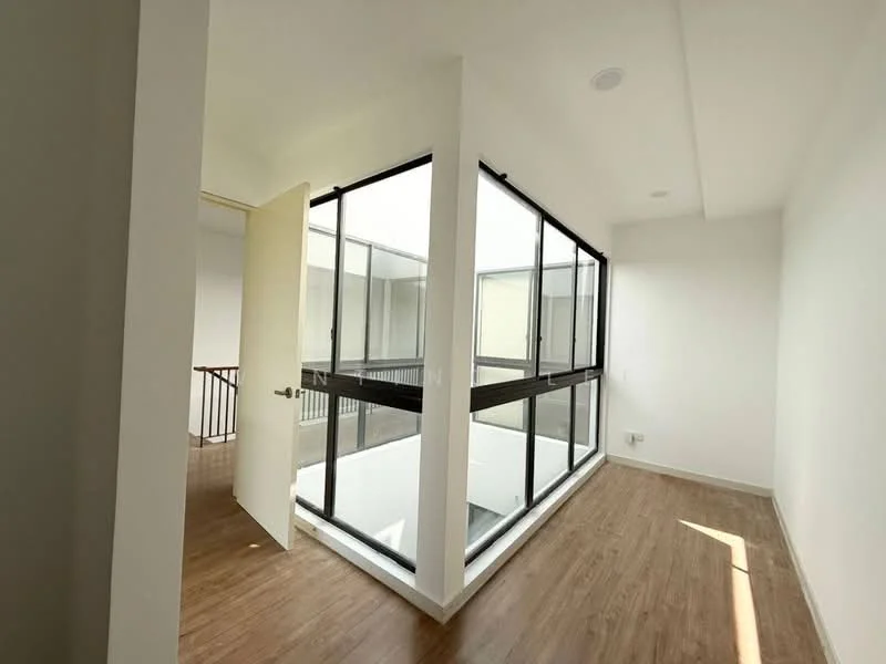 Room features: wooden flooring, white painted walls, glass windows, door with handle, natural light from windows, ceiling lights, open layout, view of interior courtyard; style: modern; view: courtyard.