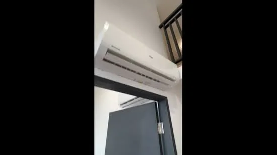 Room features: wall-mounted split AC.