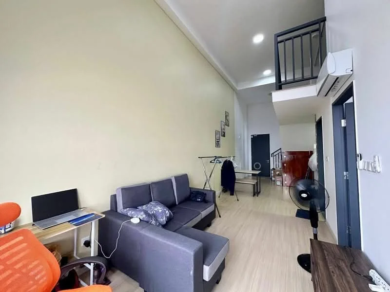 Living features: grey fabric sofa, wooden coffee table, desk with computer monitor, orange office chair, wall-mounted air conditioning unit, light wood flooring, white painted walls, recessed ceiling lights, clothes rack, standing fan; style: modern.