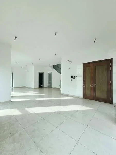 Room features: white painted walls, marble tile flooring, large windows allowing natural light, staircase in background, multiple ceiling lights, double-door entrance, open layout, neutral color palette; style: modern.