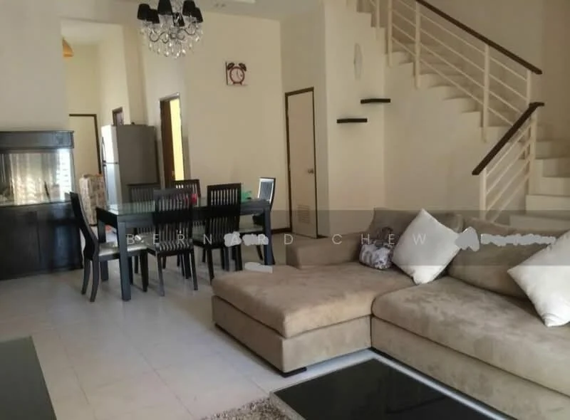 Living features: L-shape sectional sofa in beige, coffee table, area rug, wall-mounted TV, dining table with black chairs for 6, pendant light fixture, white painted walls, tile flooring, staircase with white railing, clock on wall, refrigerator visible in background; style: modern.
