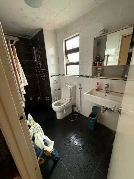 Bathroom features: black ceramic tile flooring, white tiled walls, shower area with glass partition, rain shower head, handheld shower, single-sink vanity with wall-mounted faucet, framed mirror above sink, toilet, window with sliding glass, towel rack, storage cabinet, bottle storage under sink; style: modern.