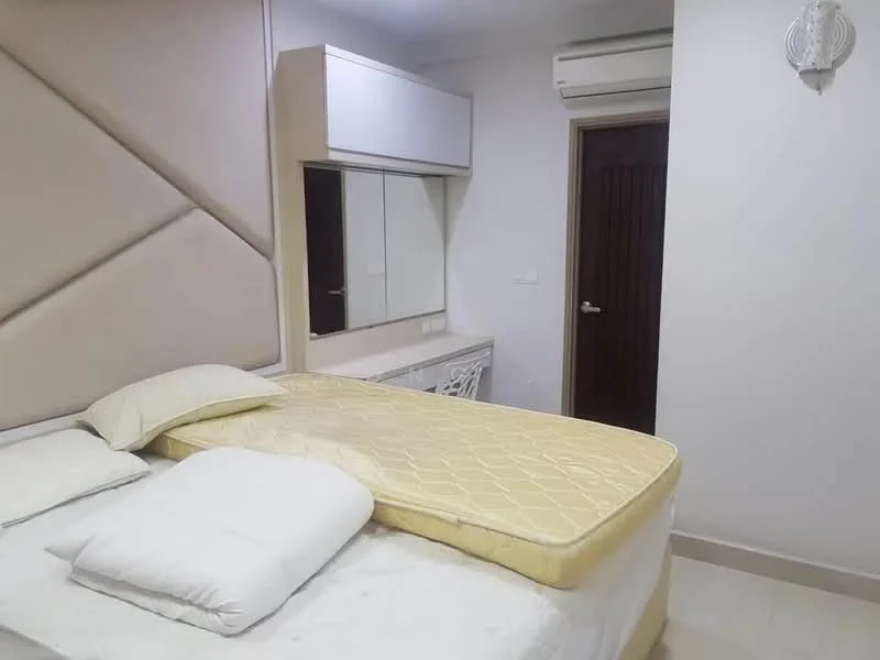 Bedroom features: queen-size bed, upholstered headboard, mattress with yellow cover, white bedding, built-in wardrobe with mirror, vanity table with drawers, wall-mounted air conditioning unit, light fixture on wall, cream painted walls, tile flooring; style: modern.