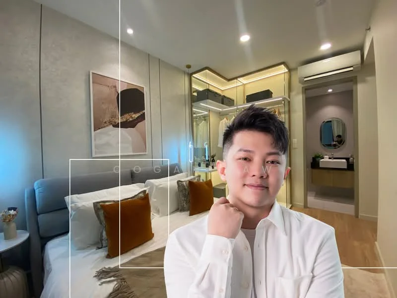Bedroom features: king-size bed, upholstered headboard, decorative throw pillows, bedside lamps, built-in wardrobe, wall-mounted mirror, recessed downlights, wooden flooring, neutral wall colour, air conditioning unit; style: modern.