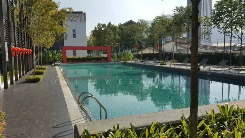 Exterior type: swimming pool deck; features: infinity pool, pool deck with loungers, manicured landscaping, tropical trees, red feature wall, surrounding greenery, paved walkway, poolside lighting; style: modern.