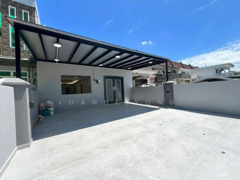 Exterior features: flat roof with metal beams, grey painted walls, large outdoor patio area, grey stone flooring, sliding glass door, outdoor lighting fixtures, surrounding wall, clear blue sky; style: modern.