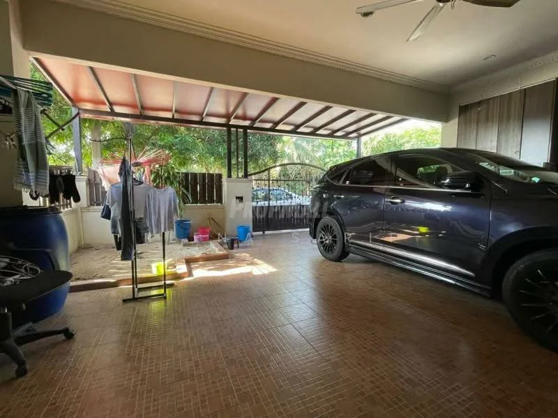 Room features: grey car parked, tiled flooring, ceiling fan, clothes drying rack, laundry area with buckets, natural light from windows, open space, partially covered area; style: modern; view: garden.