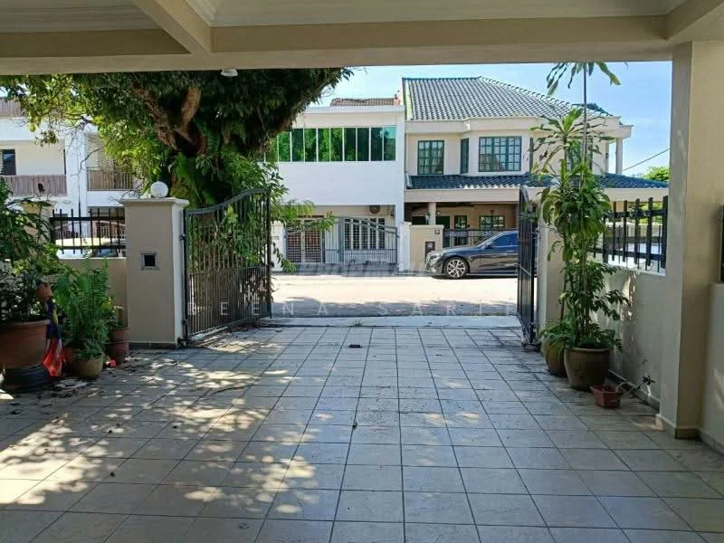Exterior type: detached bungalow; features: gated entrance, paved driveway, manicured landscaping, potted plants, fence, two-storey house visible, car parked in driveway, front yard, street view; style: modern.