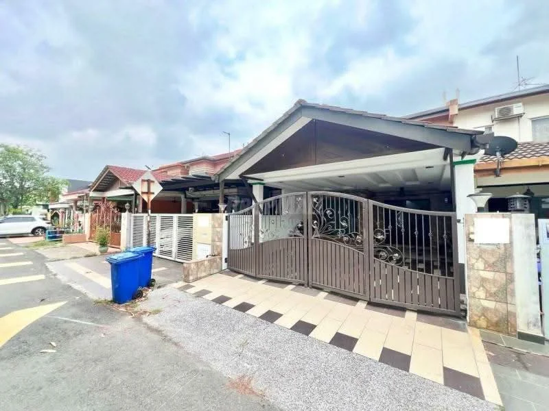 Exterior type: linked terrace house; features: gated entrance with decorative metal gate, paved driveway, stone cladding on lower wall, white painted facade, roof with overhang, manicured lawn, surrounded by residential houses, street view with road markings, visible parking area; style: modern.