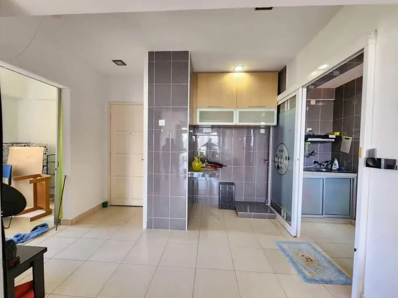 Room features: white painted walls, grey tiled flooring, kitchen cabinetry with upper and lower cabinets, stainless-steel sink, single-bowl sink, countertop with space for appliances, glass sliding door, recessed lighting, open layout, door to adjacent room, floor-to-ceiling tiles on one wall; style: modern.