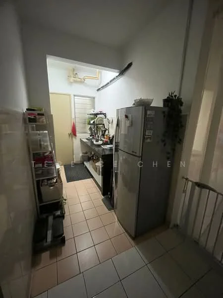 Kitchen features: grey fridge, white cabinets, black countertop, sink, wall-mounted shelves, tile flooring, white walls, window, kitchen appliances, door to hallway.