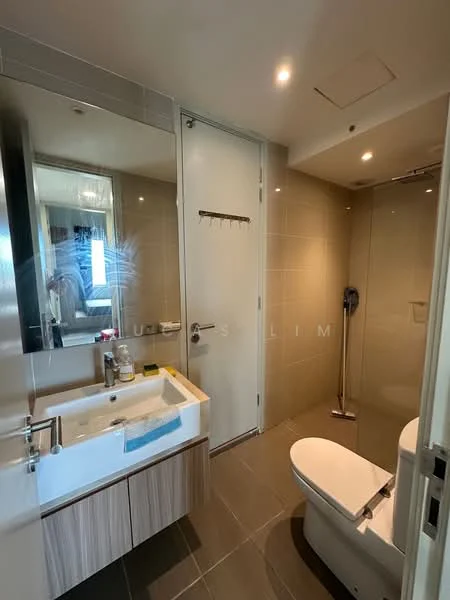 Bathroom features: single-sink vanity with wood cabinet, chrome basin mixer, framed mirror, one-piece toilet, walk-in shower with glass enclosure, rain shower head, tile cladding, grey ceramic tile flooring, recessed downlights, glass shower door; style: modern.