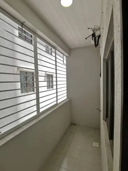 Room features: white painted walls, grey tiled flooring, horizontal metal window grilles, large windows with multiple panes, ceiling light fixture, drainage outlet on floor; style: modern.