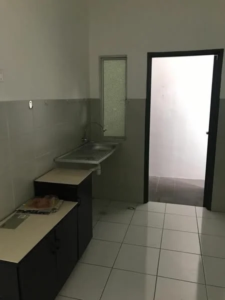 Kitchen features: white tiled walls, grey tiled backsplash, white ceramic tile flooring, single-bowl stainless-steel sink, chrome faucet, black cabinetry, countertop with storage, window with frosted glass, doorway leading to another room.