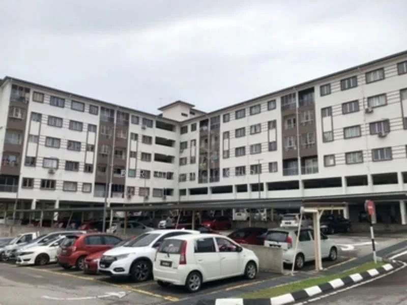 Exterior type: low-rise apartment block; features: white painted facade, grey accent panels, multiple storeys, covered parking area, open-air parking lot, balconies on upper floors, windows with grilles, entrance with canopy; style: modern.