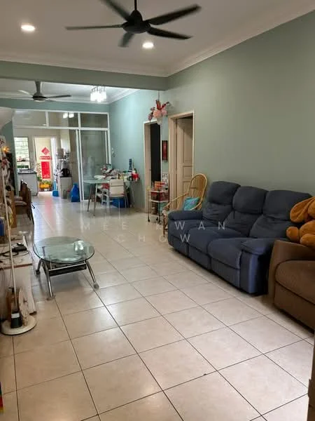 Living features: light green painted walls, white tiled flooring, 5-blade ceiling fan, 3-seater fabric sofa in navy blue, coffee table with glass top, decorative teddy bear, open layout to dining area, large windows for natural light; style: modern. Dining features: dining table with chairs, open shelving unit, kitchenette area visible, refrigerator in background; style: modern.