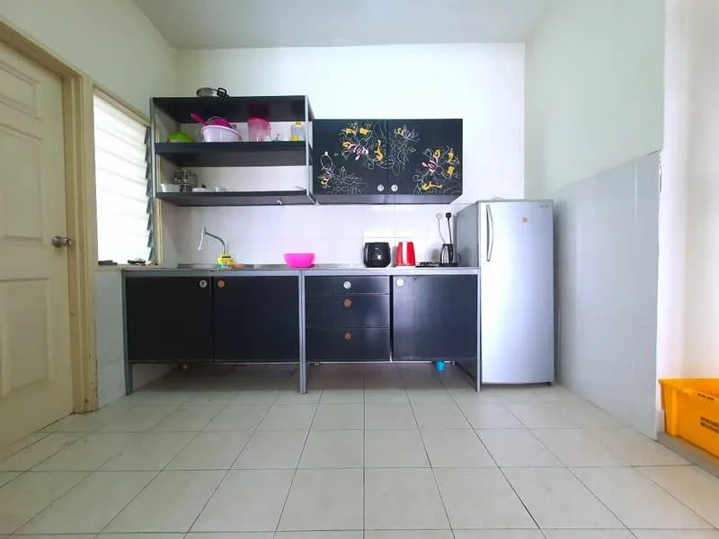 Kitchen features: black cabinetry with floral design, white tiled backsplash, stainless-steel fridge, built-in sink, countertop with space for appliances, microwave, kettle, pink bowl, ceramic plates, white tiled flooring, window with blinds, door leading to hallway; style: modern.
