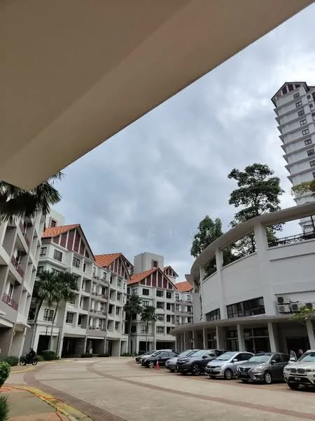 Exterior type: low-rise apartment block; features: white painted facade, red tiled roof, balconies with railings, landscaped garden with palm trees, paved driveway, multiple parking spaces, surrounded by greenery, two-storey building, modern architectural design; style: contemporary.