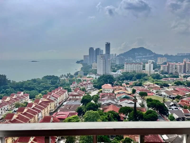 Exterior type: high-rise condominium; features: city skyline view, sea view, surrounded by greenery, mixed residential and commercial buildings, rooftops of low-rise houses, hills in the background; style: modern.