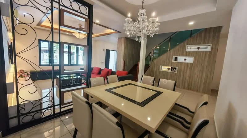 Dining features: rectangular dining table with white surface, 8 upholstered dining chairs, chandelier with multiple bulbs, decorative wall with wrought iron design, cream painted walls, recessed ceiling lights, tile flooring, open layout to living area; style: modern. Living features: red fabric sofa, coffee table, wall-mounted TV, wood panel accent wall, large windows with natural light, open layout to dining area; style: modern.