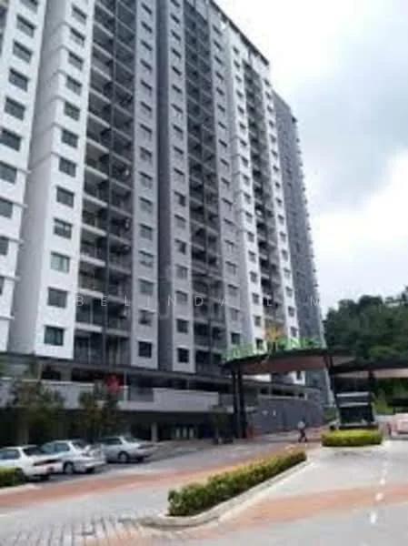 Exterior type: high-rise condominium; features: grey painted facade, glass curtain wall, recessed balconies, covered entrance with awning, landscaped garden area, manicured lawn, parking area with multiple vehicles, surrounded by greenery; style: modern.