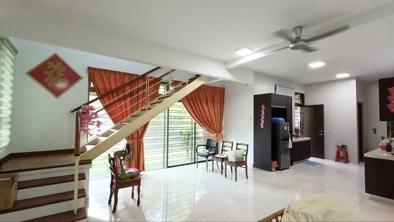 Living features: white painted walls, glossy tile flooring, 5-blade ceiling fan with light, large windows with sheer curtains, wooden staircase, orange curtains, decorative wall art, open layout connecting to kitchen, dining chairs, dining table, greenery view from windows; style: modern; view: garden. Kitchen features: dark cabinetry, countertop with breakfast bar, stainless-steel fridge, built-in oven, kitchen island, sink, kitchen appliances visible; style: modern; view: garden.