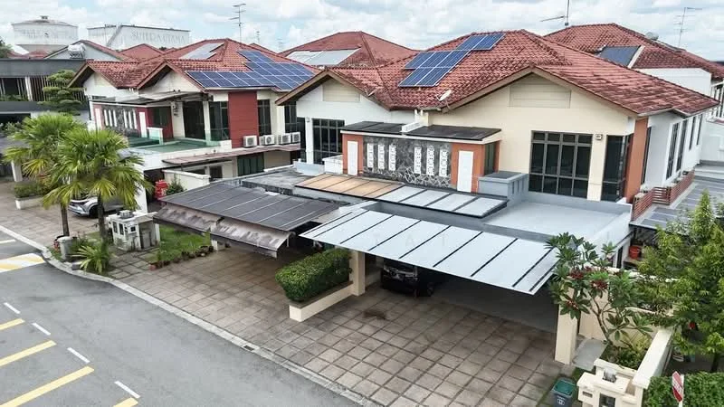Exterior type: linked terrace house; features: red tiled roof, solar panels on roof, white painted facade, car porch with awning, paved driveway, manicured landscaping, palm trees, multiple air conditioning units visible, front garden area, two-storey structure; style: modern.