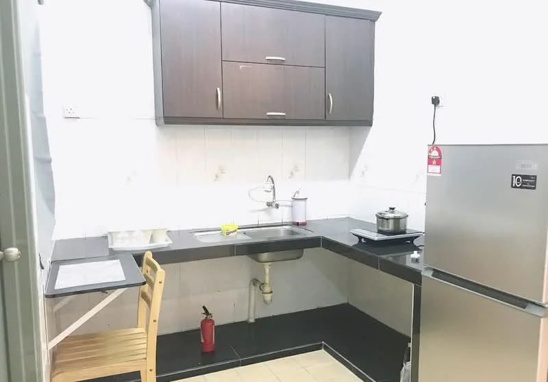 Kitchen features: dark wood cabinetry, stainless-steel sink, chrome faucet, black countertop, white tiled backsplash, built-in stove, stainless-steel fridge, tile flooring, fire extinguisher, wooden dining chair, small table; style: modern.