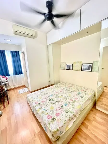 Bedroom features: queen-size bed with floral bedding, wooden flooring, mirror wardrobe, wall-mounted split AC, 5-blade ceiling fan, blue curtains, decorative wall art, natural light from window; style: modern.