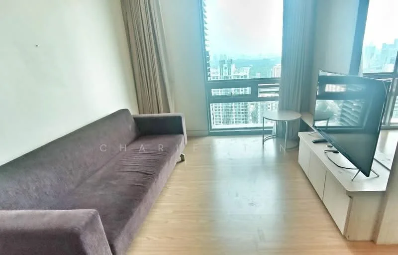 Living features: grey fabric sofa, wooden flooring, floor-to-ceiling windows, curtains, TV console, wall-mounted TV, small side table; style: modern; view: city.