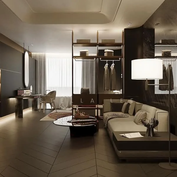 Living features: L-shape sectional sofa in grey, coffee table with decorative items, floor lamp, built-in shelving unit, wooden flooring with herringbone pattern, large windows with sheer curtains, wall-mounted mirror, desk with chair, decorative wall art, area rug with geometric pattern; style: modern; view: city.