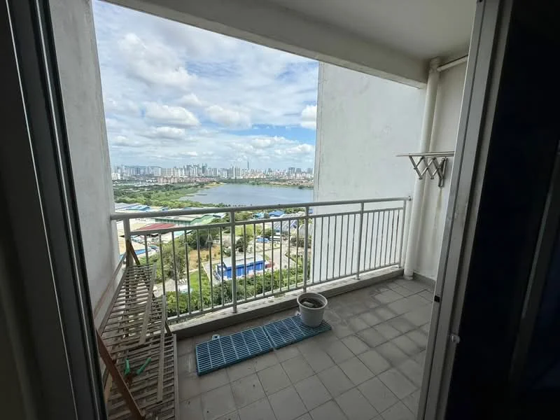 Balcony features: concrete flooring, metal railing, view of city skyline, view of water, clothes drying rack, planter pot; view: city.