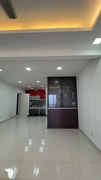 Room features: white painted walls, glossy ceramic tile flooring, recessed downlights, ceiling with cove lighting, built-in cabinetry with glass panels, open layout, neutral color scheme, visible kitchen area in background; style: modern.