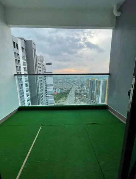 Balcony features: glass railing, artificial grass flooring, city skyline view, overhead ceiling, open space; style: modern; view: city.