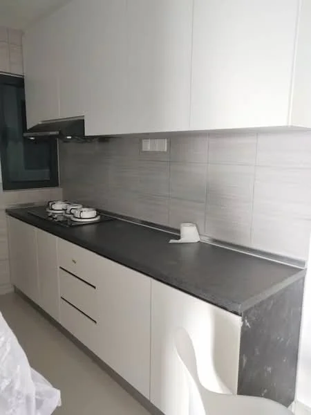 Kitchen features: white cabinetry, grey stone countertop, grey tile backsplash, built-in gas stove with 3 burners, stainless-steel range hood, single-bowl stainless-steel sink, wall-mounted faucet, light-colored flooring, window for natural light; style: modern.