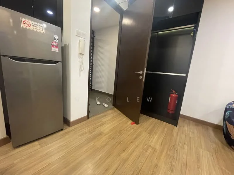 Room features: stainless-steel fridge, wooden flooring, dark wooden door, built-in wardrobe, fire extinguisher, telephone wall unit, light fixtures, white walls.