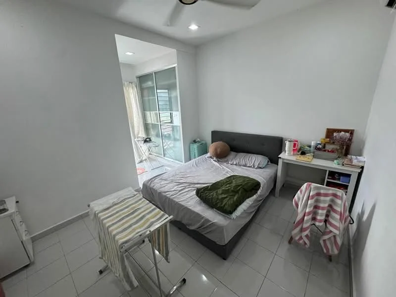 Bedroom features: queen-size bed with grey upholstered headboard, white bedding, green throw blanket, white walls, white tiled flooring, ceiling fan, window with sheer curtains, built-in wardrobe with sliding doors, small white desk, chair, laundry rack, decorative items on desk; style: modern; view: garden.
