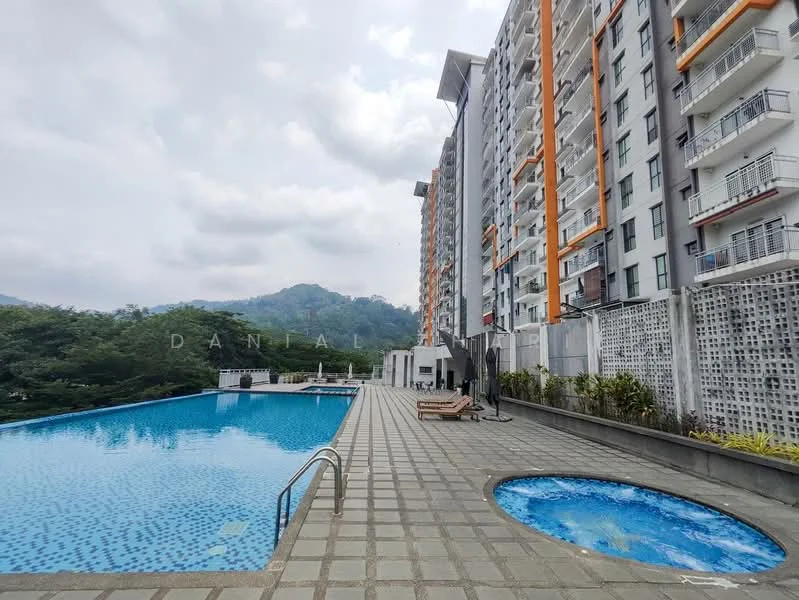 Exterior type: high-rise condominium; features: infinity pool, jacuzzi, pool deck with loungers, landscaped garden area, concrete paving, surrounded by greenery, mountain view in background, multiple storeys, balconies on upper floors, glass railing; style: modern.