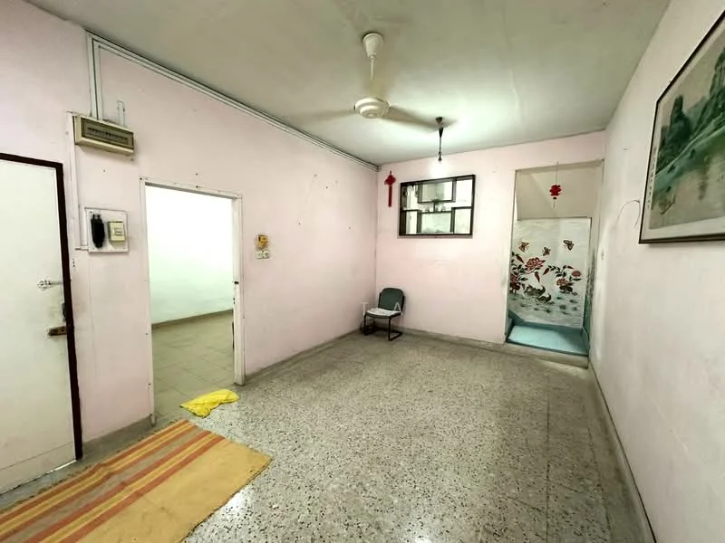 Room features: pink painted walls, polished concrete flooring, ceiling fan, window with grid pattern, doorway leading to another room, door leading outside, area rug, decorative wall art; style: minimalist.