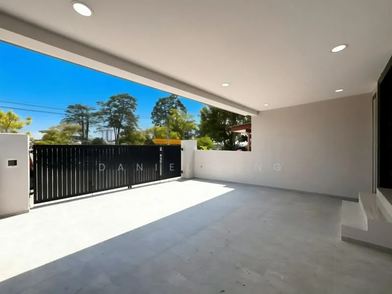 Exterior features: paved flooring, modern design, large open space, gated entrance, surrounded by greenery, natural light from large windows, minimalist aesthetic; style: modern.