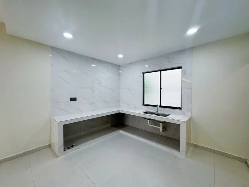 Kitchen features: white marble backsplash, grey tiled flooring, single-bowl stainless-steel sink, chrome pull-down faucet, L-shaped countertop, wall-mounted lighting, window with black frame, minimalist cabinetry, neutral wall color; style: modern.