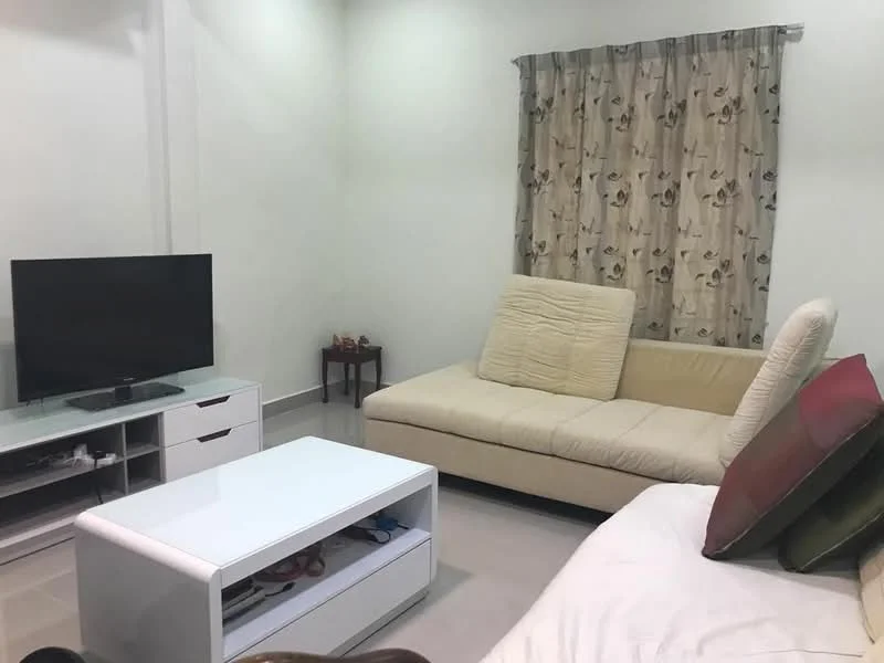 Living features: beige fabric sectional sofa, white coffee table with storage, flat-screen TV on media console, light-colored walls, curtains with floral pattern, tile flooring, decorative cushions, small side table; style: modern.