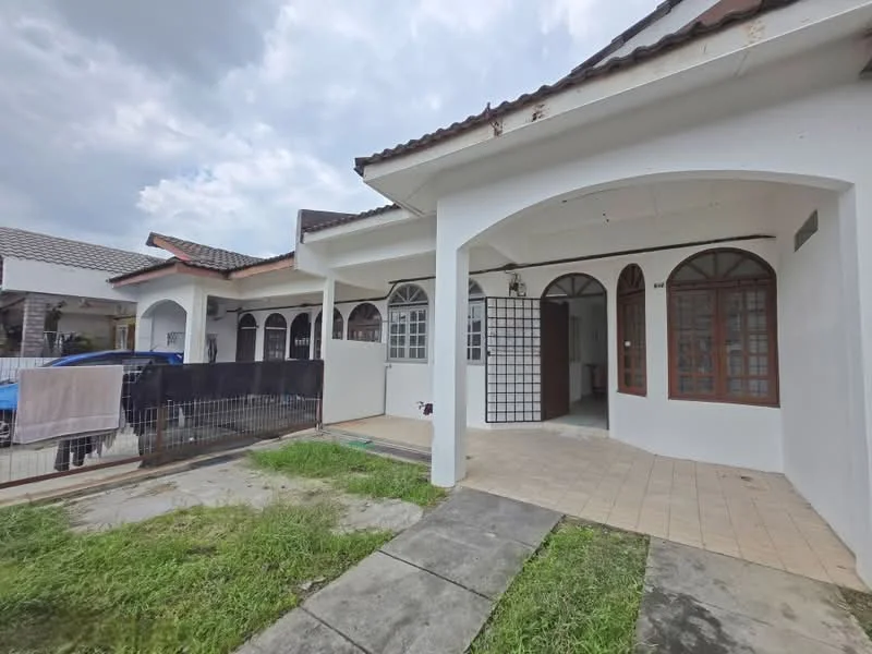 Exterior type: linked terrace house; features: white painted facade, arched doorways, gabled roof, paved walkway, manicured lawn, fenced front yard, multiple windows with wooden frames, tile flooring at entrance, single-storey, surrounded by residential area; style: modern.