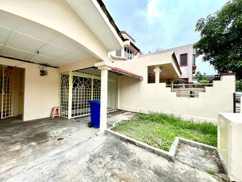 Exterior type: semi-detached house; features: concrete driveway, manicured lawn, garden area, metal gate, gravel pathway, exposed brick wall, covered porch, single-storey, surrounded by greenery; style: modern.
