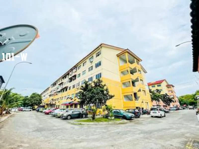 Exterior type: low-rise apartment block; features: yellow painted facade, 3-storey building, parking lot with multiple cars, landscaped area with trees, balconies on upper floors, street lighting, surrounded by greenery; style: modern.