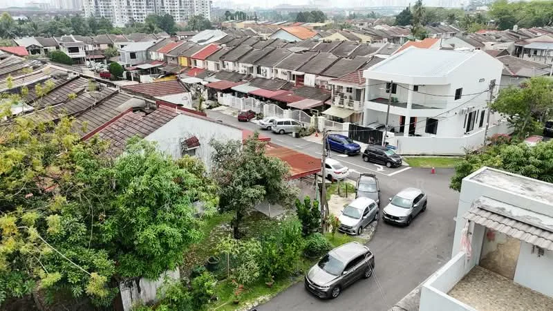 Exterior type: linked terrace house; features: two-storey linked terrace houses, red-tiled roofs, manicured lawns, mature trees, paved road, multiple parked cars, surrounding greenery, urban residential area; style: modern.