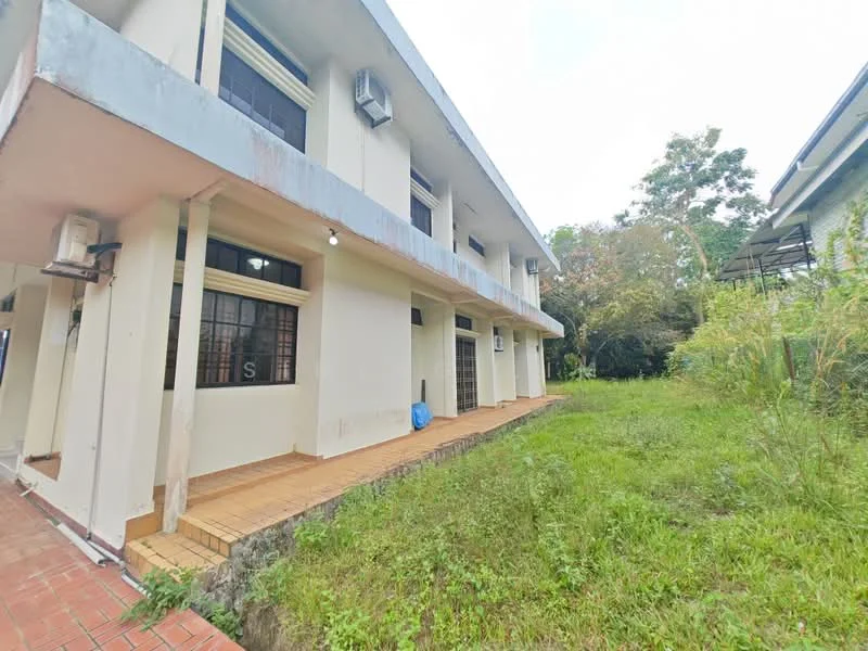 Exterior type: detached bungalow; features: two-storey building, white painted facade, terracotta tile flooring at entrance, visible air conditioning unit, manicured lawn, surrounded by greenery, sliding glass doors, windows with grills, concrete steps leading to entrance, garden area; style: modern.