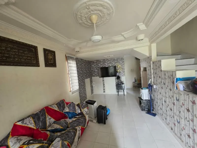 Living features: white painted walls, decorative ceiling with crown moulding, ceiling fan, wall-mounted TV, sofa with colorful upholstery, tile flooring, window with blinds, decorative wall with patterned wallpaper, small side table, luggage, standing fan; style: modern.