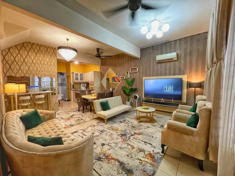 Living features: cream upholstered sofa with curved arms, green accent cushions, beige armchair with tufted design, round coffee table with gold frame, area rug with abstract pattern, wall-mounted flat-screen TV, wood panel accent wall, ceiling fan with light, chandelier with multiple bulbs, large windows with sheer curtains, decorative plant in pot, wall-mounted decorative mirror, open-plan layout connecting to dining area; style: modern.